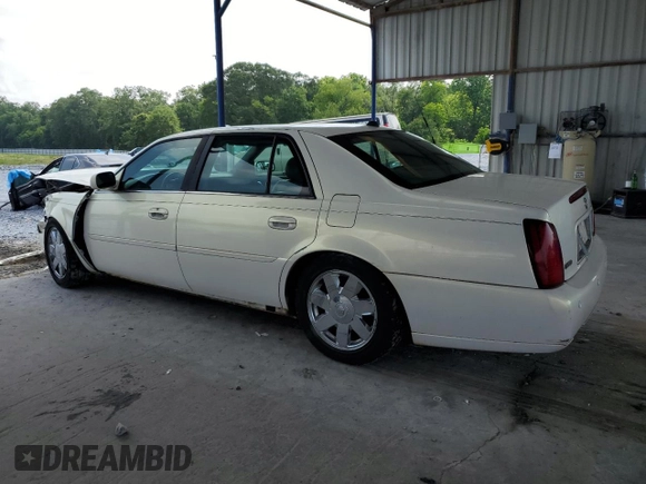 2004 Cadillac DeVille DTS z VIN 1G6KF57924U185324, wystawiony jako Copart lot #58222205 z przebiegiem 182 640 mil mil oraz Szkoda całkowita • Salvage title. Historia ofert i sprzedaży dostępna na DreamBid. Obrazek 2.