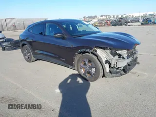 2022 Ford Mustang Mach-E Select z VIN 3FMTK1RM9NMA44548, wystawiony jako IAAI lot #41347236 z przebiegiem 74 329 mil mil oraz . Historia ofert i sprzedaży dostępna na DreamBid. Obrazek 1.