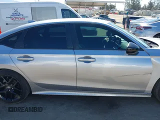 2023 Honda Civic Sport with VIN 2HGFE2F56PH500505, listed as a IAAI auction lot 42239112 with 39,513 mi miles and . Bid and sale history available at DreamBid. Image 13.