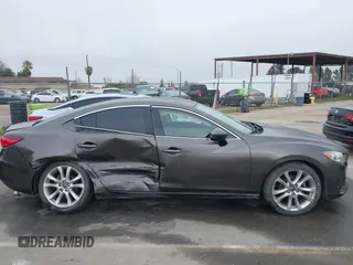 2016 Mazda 6 i Touring with VIN JM1GJ1V52G1473330, listed as a IAAI auction lot 41657684 with 138,064 mi miles and . Bid and sale history available at DreamBid. Image 13.