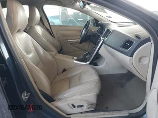 2014 Volvo S60 T5 with VIN YV1612FS2E2282675, listed as a IAAI auction lot 40797039 with 121,598 mi miles. Bid and sale history available at carsss.com. Image 5.