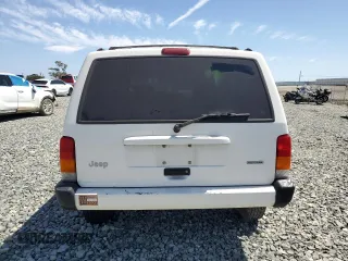 2000 Jeep Cherokee with VIN 1J4FT48S6YL152495, listed as a Copart auction lot 60627965 with 196,086 mi miles and Salvage title. Bid and sale history available at DreamBid. Image 6.