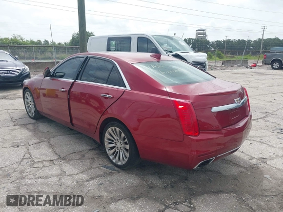 2015 Cadillac CTS Luxury AWD with VIN 1G6AX5SX2F0112852, listed as a IAAI auction lot 42398611 with 70,253 mi miles and . Bid and sale history available at DreamBid. Image 3.