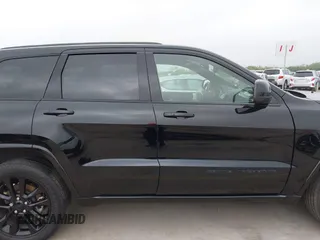 2021 Jeep Grand Cherokee Laredo X with VIN 1C4RJEAG8MC714539, listed as a IAAI auction lot 42190686 with 59,359 mi miles and . Bid and sale history available at DreamBid. Image 13.