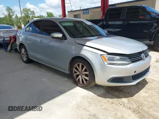2014 Volkswagen Jetta SE with VIN 3VWD07AJ9EM204525, listed as a IAAI auction lot 42831600 with 144,363 mi miles and . Bid and sale history available at DreamBid. Image 1.
