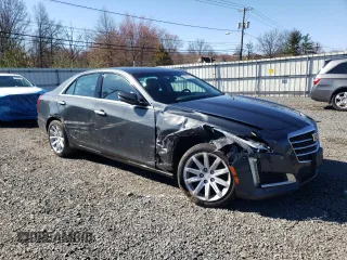 2015 Cadillac CTS AWD with VIN 1G6AW5SX8F0134518, listed as a Copart auction lot 50009215 with 91,545 mi miles and Salvage title. Bid and sale history available at DreamBid. Image 4.