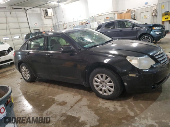 2010 Chrysler Sebring Touring with VIN 1C3CC4FBXAN112107, listed as a Copart auction lot 53942745 with 134,629 mi miles and Salvage Title. Bid and sale history available at carsss.com. Image 4.