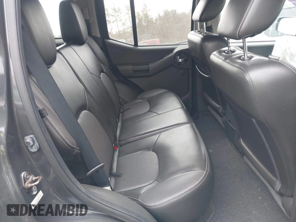 2014 Nissan Xterra X with VIN 5N1AN0NW5EN810488, listed as a IAAI auction lot 41705791 with 127,936 mi miles and . Bid and sale history available at DreamBid. Image 8.