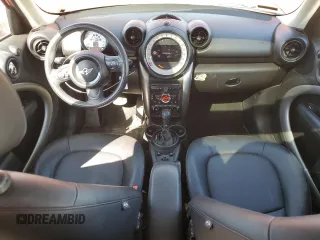 2014 MINI Countryman with VIN WMWZB3C5XEWR42035, listed as a Copart auction lot 61846725 with 105,131 mi miles and Salvage title. Bid and sale history available at DreamBid. Image 8.