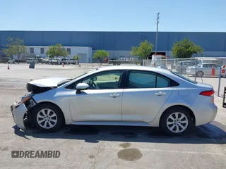 2020 Toyota Corolla LE with VIN JTDEPRAE9LJ020990, listed as a IAAI auction lot 42087507 with 54,314 mi miles and . Bid and sale history available at DreamBid. Image 14.