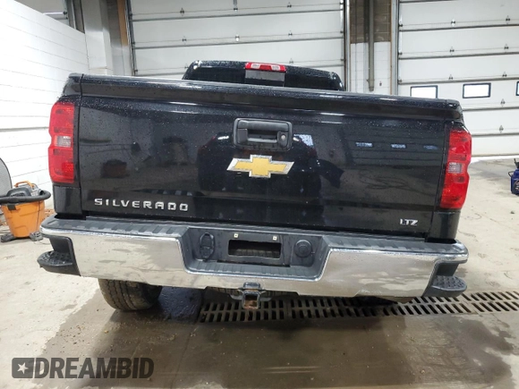 2014 Chevrolet Silverado 1500 LTZ with VIN 1GCVKSEJ7EZ319699, listed as a Copart auction lot 66067564 with 44,786 mi miles and Salvage Title. Bid and sale history available at DreamBid. Image 6.