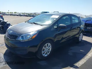 2014 Kia Rio LX with VIN KNADM4A39E6364490, listed as a IAAI auction lot 42128702 with 130,981 mi miles and . Bid and sale history available at DreamBid. Image 18.