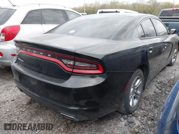 2015 Dodge Charger SE with VIN 2C3CDXBG7FH841469, listed as a IAAI auction lot 42001599 with 103,342 mi miles and . Bid and sale history available at DreamBid. Image 4.