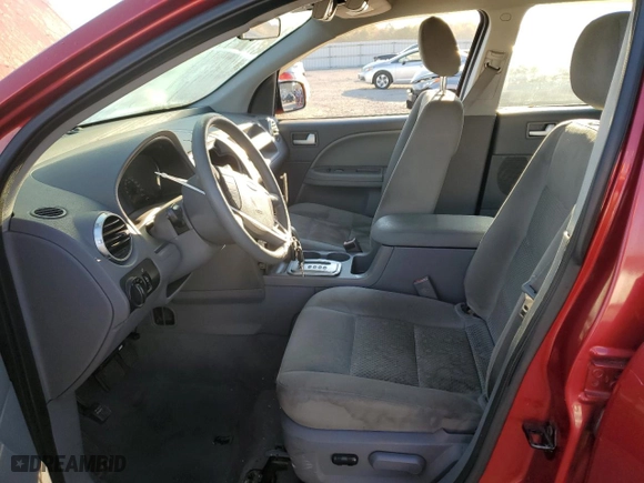 2005 Ford Freestyle SE with VIN 1FMZK04125GA07000, listed as a Copart auction lot 77009554 with 145,858 mi miles and Salvage Title. Bid and sale history available at carsss.com. Image 7.