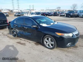 2011 Acura TSX with VIN JH4CU2F68BC002085, listed as a IAAI auction lot 41852295 with 203,747 mi miles. Bid and sale history available at carsss.com. Image 1.