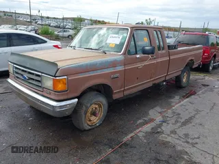 1989 Ford F-150 with VIN 1FTEX14Y1KKA59105, listed as a IAAI auction lot 42649376 with 50,869 mi miles and . Bid and sale history available at DreamBid. Image 2.