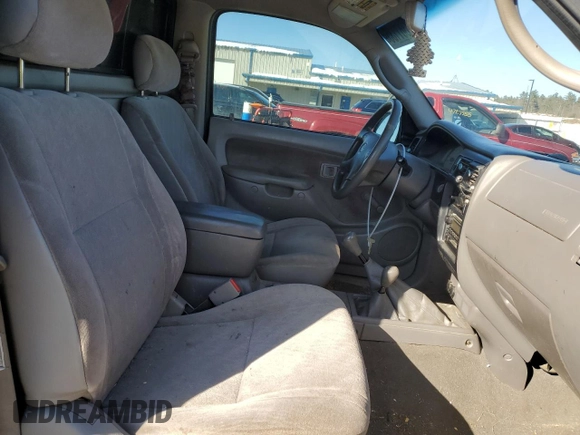 2002 Toyota Tacoma z VIN 5TEPM62N12Z011042, wystawiony jako Copart lot #47381135 z przebiegiem 217 358 mil mil oraz Szkoda całkowita • Salvage title. Historia ofert i sprzedaży dostępna na DreamBid. Obrazek 10.