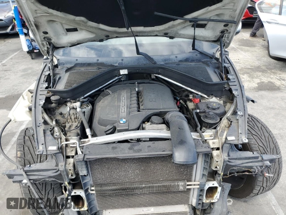2011 BMW X5 35i with VIN 5UXZV4C55BL406427, listed as a Copart auction lot 50256895 with 155,662 mi miles and Salvage Title. Bid and sale history available at carsss.com. Image 12.