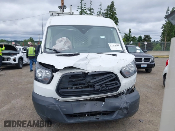 2018 Ford Transit Cargo z VIN 1FTYR2CGXJKB29432, wystawiony jako IAAI lot #42419726 z przebiegiem 80 543 mil mil oraz . Historia ofert i sprzedaży dostępna na DreamBid. Obrazek 12.