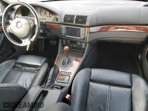 2001 BMW 5 Series 540iA with VIN WBADN634X1GM73365, listed as a Copart auction lot 77814684 with 142,374 mi miles and Salvage Title. Bid and sale history available at carsss.com. Image 8.