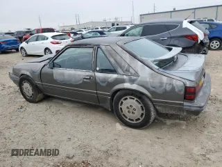 1986 Ford Mustang with VIN 1FABP28T8GF109009, listed as a Copart auction lot 83148544 with 329,005 mi miles and Salvage title. Bid and sale history available at DreamBid. Image 2.