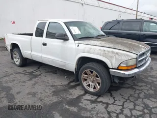 2003 Dodge Dakota SLT with VIN 1D7HL42N83S296040, listed as a IAAI auction lot 41462371 with 250,407 mi miles. Bid and sale history available at carsss.com. Image 1.