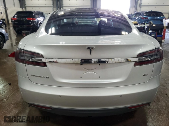 2014 Tesla Model S 60 with VIN 5YJSA1H15EFP51239, listed as a Copart auction lot 59214485 with 153,554 mi miles and Salvage title. Bid and sale history available at DreamBid. Image 6.