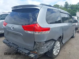2013 Toyota Sienna LE with VIN 5TDJK3DC9DS054310, listed as a IAAI auction lot 42668103 with 209,712 mi miles and . Bid and sale history available at DreamBid. Image 4.