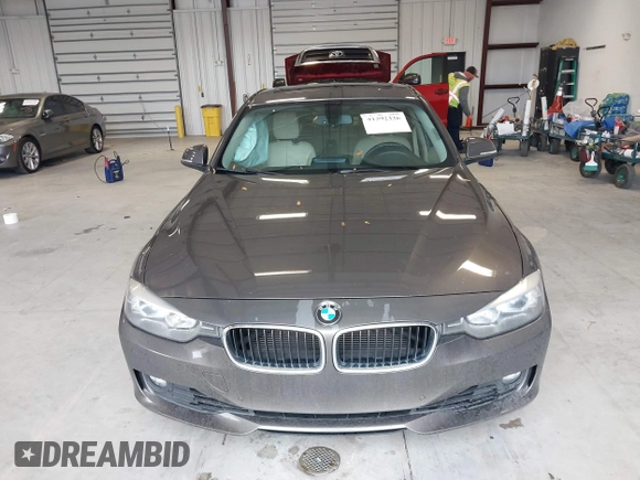 2015 BMW 3 Series 328i with VIN WBA3A5C57FF609734, listed as a IAAI auction lot 41392336 with 121,378 mi miles. Bid and sale history available at carsss.com. Image 12.