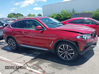 2021 BMW X4 xDrive30i with VIN 5UX2V1C07M9F59530, listed as a IAAI auction lot 42484957 with Not provided miles and . Bid and sale history available at DreamBid. Image 13.