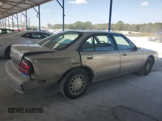 1998 Oldsmobile 88 LS z VIN 1G3HN52K4W4803377, wystawiony jako Copart lot #75638114 z przebiegiem 75 754 mil mil oraz Tytuł czysty. Historia ofert i sprzedaży dostępna na DreamBid. Obrazek 3.