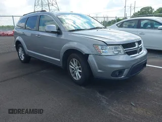 2017 Dodge Journey SXT z VIN 3C4PDCBG1HT590917, wystawiony jako IAAI lot #42692623 z przebiegiem 159 959 mil mil oraz . Historia ofert i sprzedaży dostępna na DreamBid. Obrazek 1.