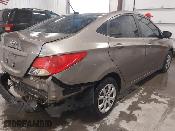 2013 Hyundai Accent GLS with VIN KMHCT4AE2DU486097, listed as a IAAI auction lot 41972806 with 295,949 mi miles. Bid and sale history available at carsss.com. Image 4.
