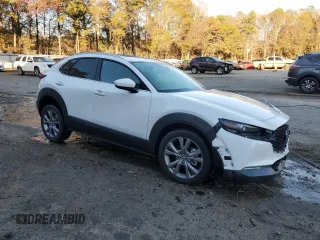 2020 Mazda CX-30 Premium with VIN 3MVDMAEMXLM102106, listed as a Copart auction lot 82964204 with 31,777 mi miles and Salvage title. Bid and sale history available at DreamBid. Image 4.