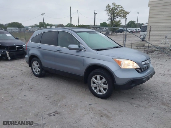 2009 Honda CR-V EX-L with VIN JHLRE387X9C006124, listed as a IAAI auction lot 41757092 with 142,038 mi miles. Bid and sale history available at carsss.com. Image 1.