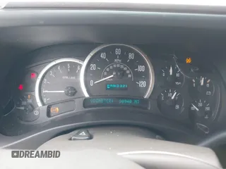 2003 Cadillac Escalade z VIN 1GYEK63N13R140496, wystawiony jako IAAI lot #42366303 z przebiegiem 90 940 mil mil oraz . Historia ofert i sprzedaży dostępna na DreamBid. Obrazek 7.