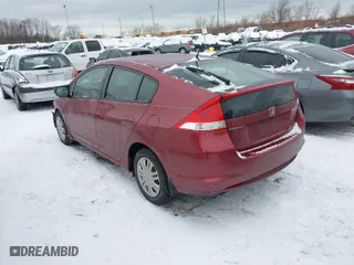 2010 Honda Insight LX with VIN JHMZE2H51AS004907, listed as a IAAI auction lot 41259182 with 76,494 mi miles. Bid and sale history available at carsss.com. Image 3.