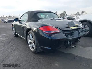 2012 Porsche Boxster with VIN WP0CA2A8XCS710347, listed as a IAAI auction lot 41212971 with 75,385 mi miles. Bid and sale history available at carsss.com. Image 3.