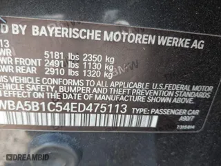 2014 BMW 5 Series 535i with VIN WBA5B1C54ED475113, listed as a IAAI auction lot 42077901 with 145,341 mi miles. Bid and sale history available at carsss.com. Image 9.