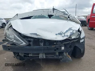 2017 Nissan Sentra SR z VIN 3N1AB7AP1HY294547, wystawiony jako IAAI lot #42162519 z przebiegiem 106 594 mil mil oraz . Historia ofert i sprzedaży dostępna na DreamBid. Obrazek 6.