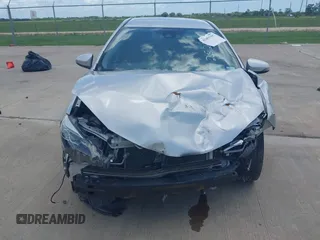 2017 Toyota Corolla L z VIN 5YFBURHE4HP732912, wystawiony jako IAAI lot #42451597 z przebiegiem 73 901 mil mil oraz . Historia ofert i sprzedaży dostępna na DreamBid. Obrazek 12.