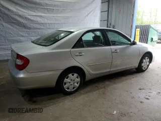 2003 Toyota Camry LE with VIN 4T1BE32K33U710903, listed as a Copart auction lot 56976585 with 157,444 mi miles and Clean Title. Bid and sale history available at DreamBid. Image 3.