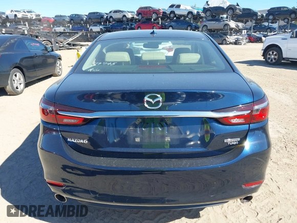 2021 Mazda 6 Grand Touring with VIN JM1GL1TY3M1619771, listed as a IAAI auction lot 40964809 with 25,816 mi miles and . Bid and sale history available at DreamBid. Image 16.