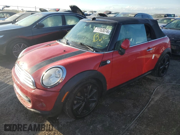 2014 MINI Convertible with VIN WMWZN3C5XET266498, listed as a Copart auction lot 77763074 with 76,680 mi miles and Non repairable. Bid and sale history available at DreamBid. Image 1.