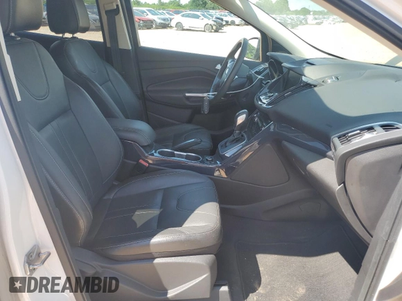 2013 Ford Escape Titanium with VIN 1FMCU0J98DUC67136, listed as a Copart auction lot 57967495 with 72,258 mi miles and Salvage title. Bid and sale history available at DreamBid. Image 7.