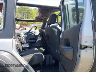 2018 Jeep Wrangler Unlimited Sport S z VIN 1C4HJXDG9JW150509, wystawiony jako IAAI lot #41989409 z przebiegiem Nie podano mil oraz . Historia ofert i sprzedaży dostępna na DreamBid. Obrazek 8.