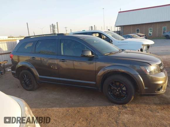 2019 Dodge Journey SE z VIN 3C4PDCBB8KT858387, wystawiony jako IAAI lot #42051620 z przebiegiem 76 126 mil mil oraz . Historia ofert i sprzedaży dostępna na DreamBid. Obrazek 13.