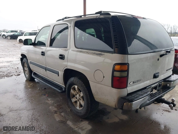 2004 Chevrolet Tahoe LT with VIN 1GNEC13ZX4J131652, listed as a IAAI auction lot 41551921 with 395,802 mi miles. Bid and sale history available at carsss.com. Image 3.
