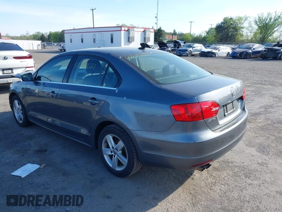 2013 Volkswagen Jetta TDI w/Premium z VIN 3VWLL7AJ6DM291317, wystawiony jako IAAI lot #42091621 z przebiegiem 169 448 mil mil oraz . Historia ofert i sprzedaży dostępna na DreamBid. Obrazek 3.