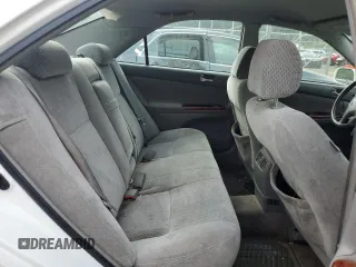 2004 Toyota Camry LE z VIN 4T1BE30K04U301360, wystawiony jako Copart lot #60804115 z przebiegiem 287 009 mil mil oraz Szkoda całkowita • Salvage title. Historia ofert i sprzedaży dostępna na DreamBid. Obrazek 10.